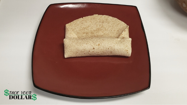 Finishing rolling a burrito